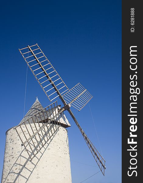 An old windmill on a sunny day in southern france