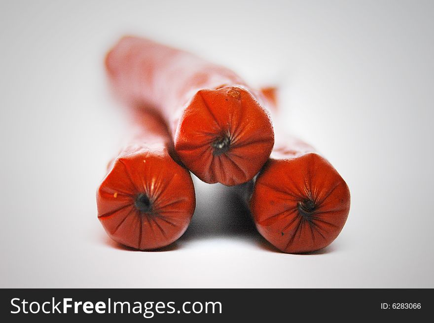 Delicious sausages isolated on white