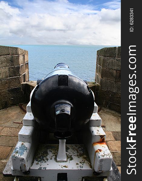 A canon at Carrickfergus castle overlooking the lough. A canon at Carrickfergus castle overlooking the lough