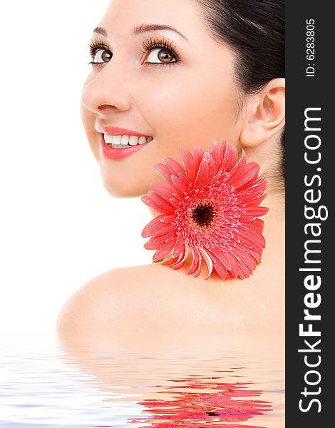 Young woman with gerber flower