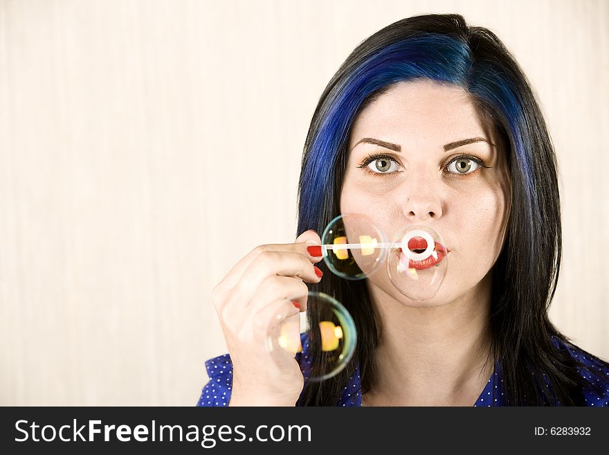 Pretty Woman Blowing Bubbles