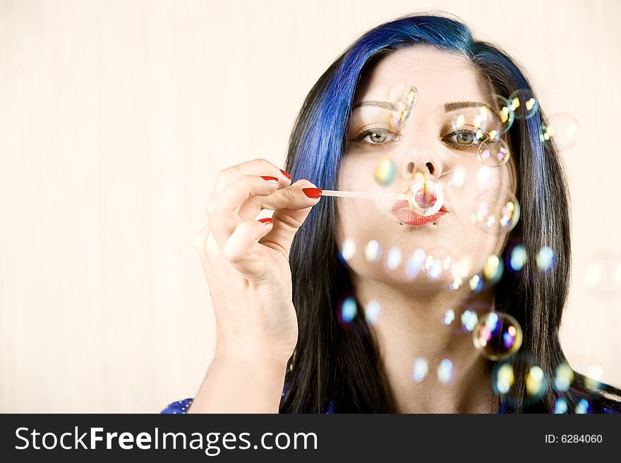 Pretty Woman with Big Eyes Woman Blowing Many Bubbles. Pretty Woman with Big Eyes Woman Blowing Many Bubbles