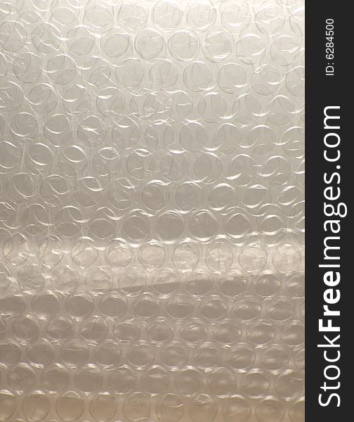 Background made of plastic bubble wrap sheets. Background made of plastic bubble wrap sheets