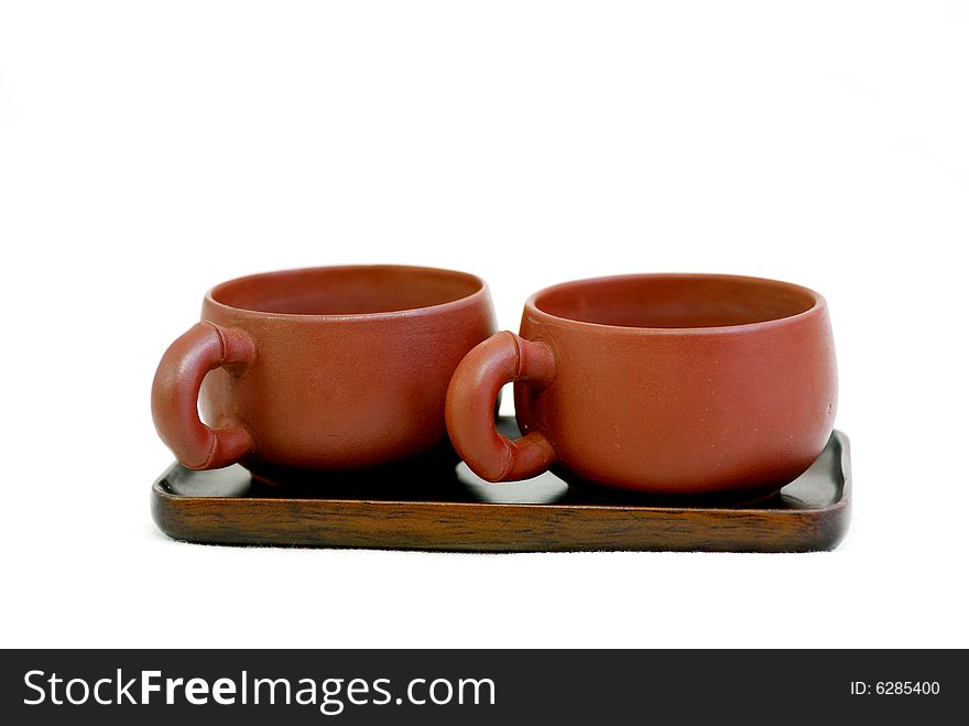 Couple tea cup put on wooden plate. Couple tea cup put on wooden plate