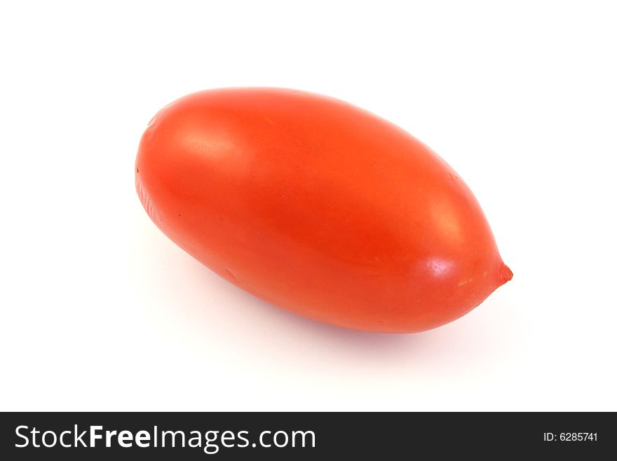 Red tomato isolated in studio