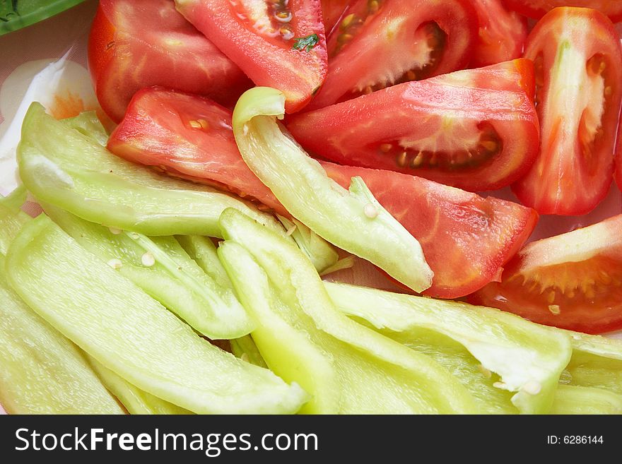Green pepper and tomato background