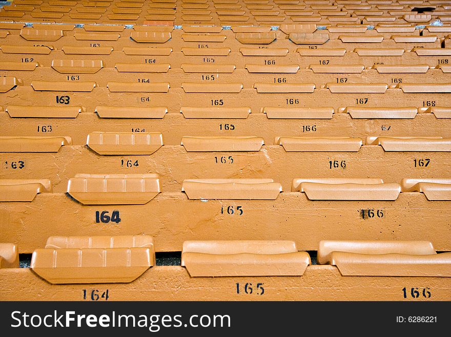 Rows of unused stadium seating - landscape exterior