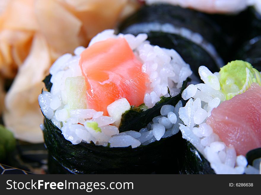 Appetizing sushi with ginger close-up. Appetizing sushi with ginger close-up