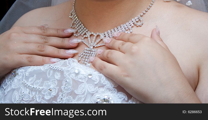 Beautiful diamonds bride necklace on the neck