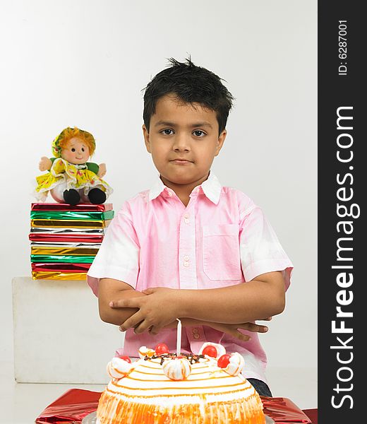 Boy wearing pink shirt celebrating birthday party. Boy wearing pink shirt celebrating birthday party
