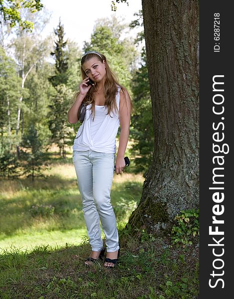 Portrait of young girl on forest background