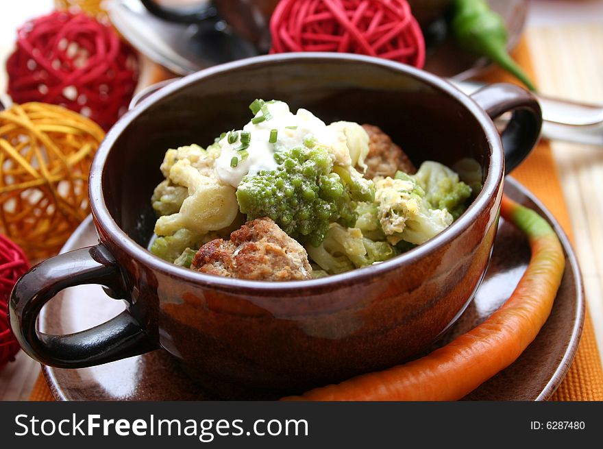 A stew of romanesque and meatballs