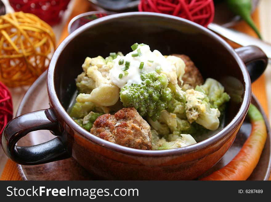 A stew of romanesque and meatballs