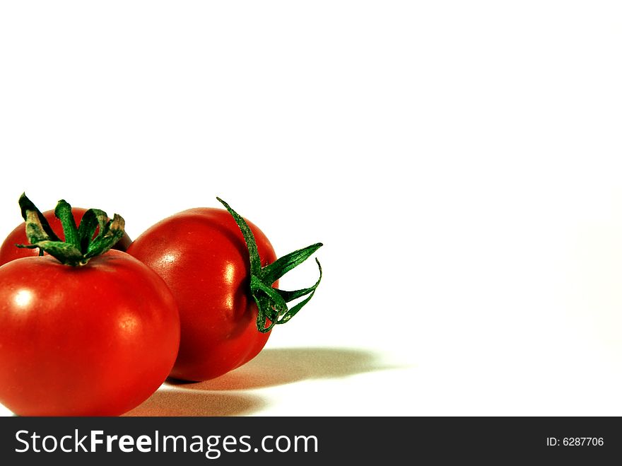 Photo red tomato on a white background