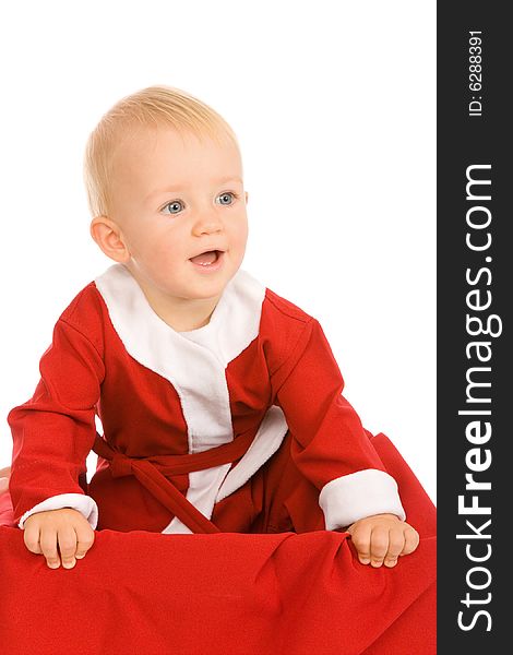 Small boy dressed as Santa Claus on a white background. Small boy dressed as Santa Claus on a white background