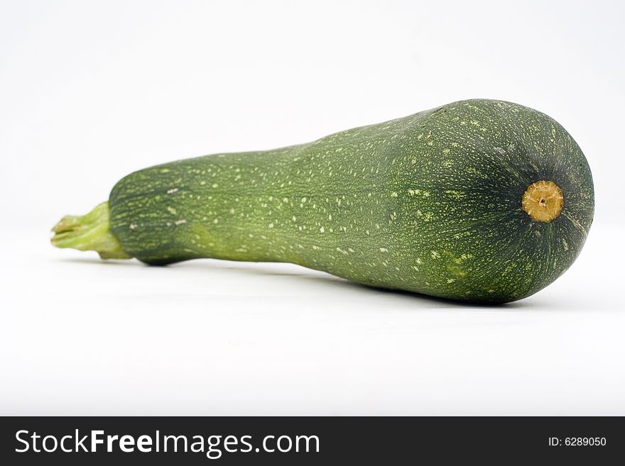 Fresh zucchini isolated over white