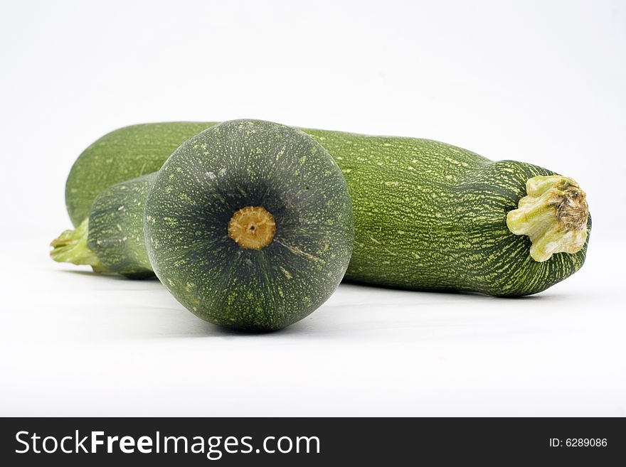 Fresh zucchini isolated over white