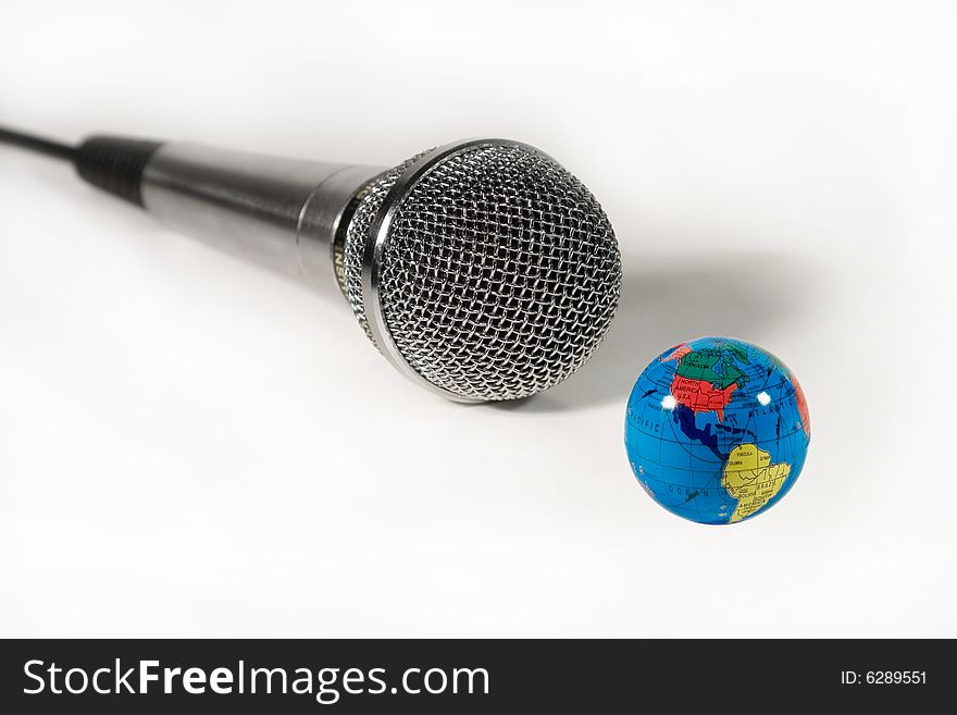 Microphone And A Small Globe