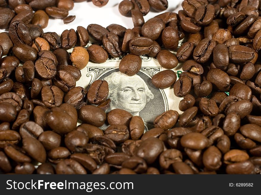 Dollars and coffee beans