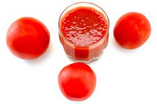 Fresh Tomato Juice In Glass And Tomatoes. Stock Photography Fresh Tomato Juice In Glass And Tomatoes. Stock Photography