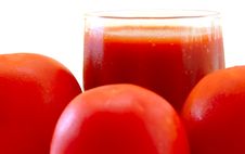 Fresh Tomato Juice In Glass And Tomatoes. Stock Photo Fresh Tomato Juice In Glass And Tomatoes. Stock Photo