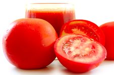 Fresh Tomato Juice In Glass And Tomatoes. Royalty Free Stock Image Fresh Tomato Juice In Glass And Tomatoes. Royalty Free Stock Image