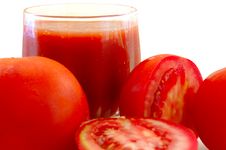 Fresh Tomato Juice In Glass And Tomatoes. Royalty Free Stock Images Fresh Tomato Juice In Glass And Tomatoes. Royalty Free Stock Images