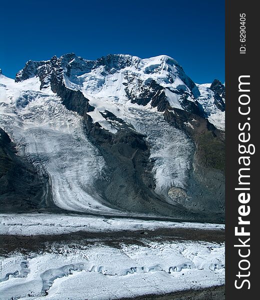 The Breithorn is a mountain (4164 m height))in the Alps, considered the most easily climbed 4,000 m Alpine peak. This is due to the Klein Matterhorn cable car which takes climbers to over 3,870 m for a starting point. The Breithorn was first climbed in 1813. The Breithorn is a mountain (4164 m height))in the Alps, considered the most easily climbed 4,000 m Alpine peak. This is due to the Klein Matterhorn cable car which takes climbers to over 3,870 m for a starting point. The Breithorn was first climbed in 1813.