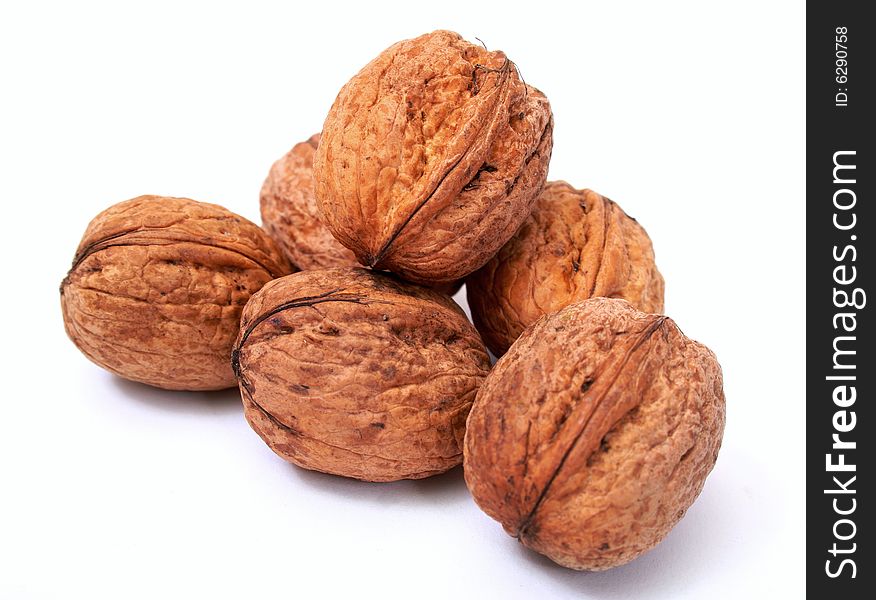 Walnut in closeup isolated on white background