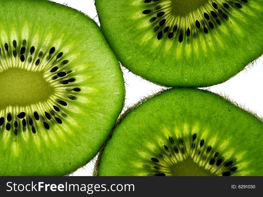 Three slices of kiwi fruit