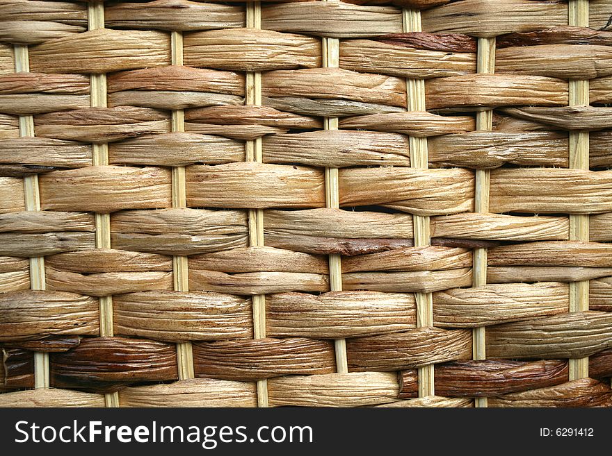 Detail of wickers and canes basket. Natural background. Detail of wickers and canes basket. Natural background.