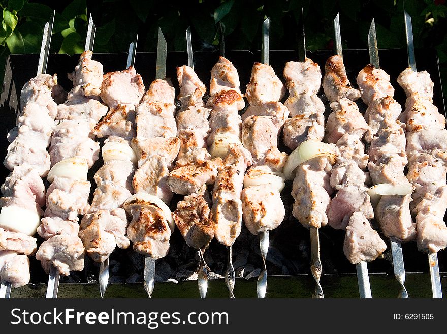 Appetizing shashlik on metal skewers