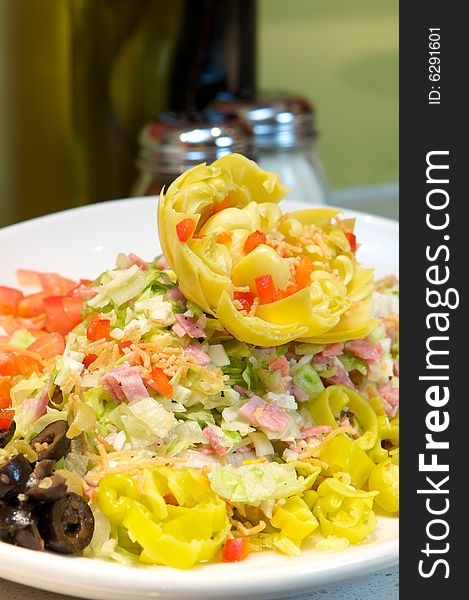 An image of a bountiful artichoke salad. An image of a bountiful artichoke salad
