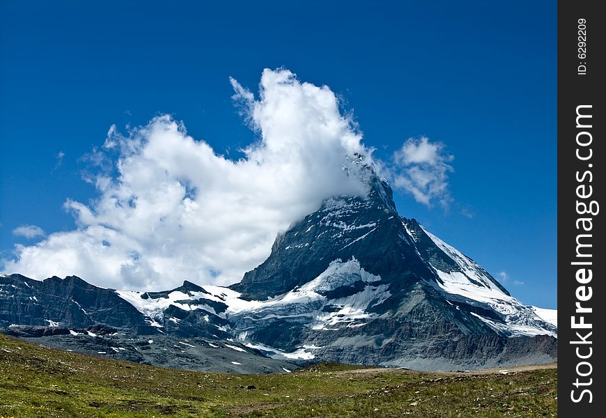 Matterhorn (Monte Cervino) is one of the highest summits from Europe (4478 m altitude) at the border between Switzerland and Italy. Matterhorn (Monte Cervino) is one of the highest summits from Europe (4478 m altitude) at the border between Switzerland and Italy.