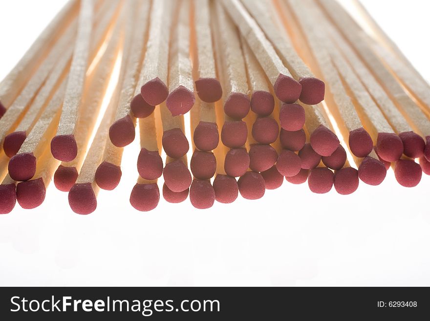 Bunch of wooden matches isolated on white background. Bunch of wooden matches isolated on white background