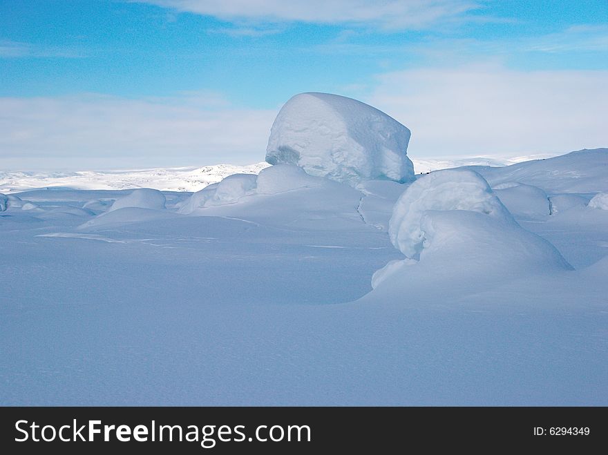 Detail of snow-covered rocks in Greenland