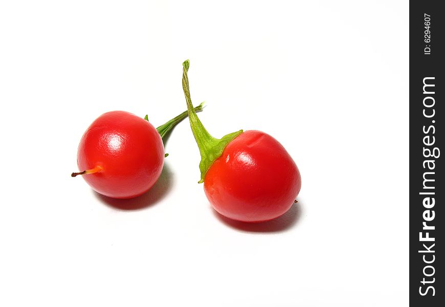 Detail of two red chillis