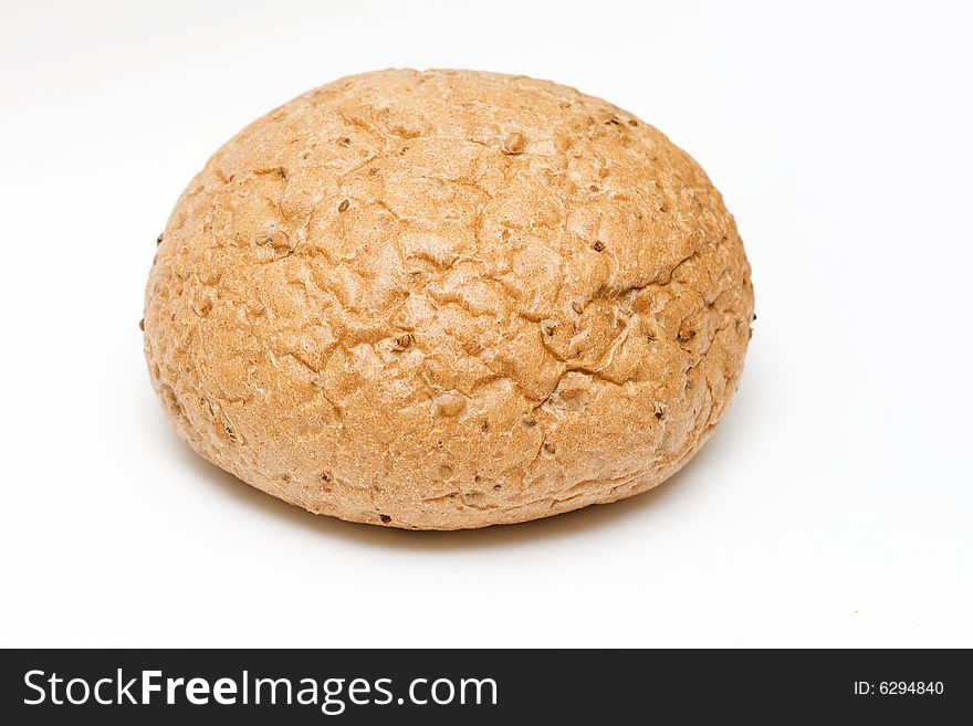 Round bread on neutral white background