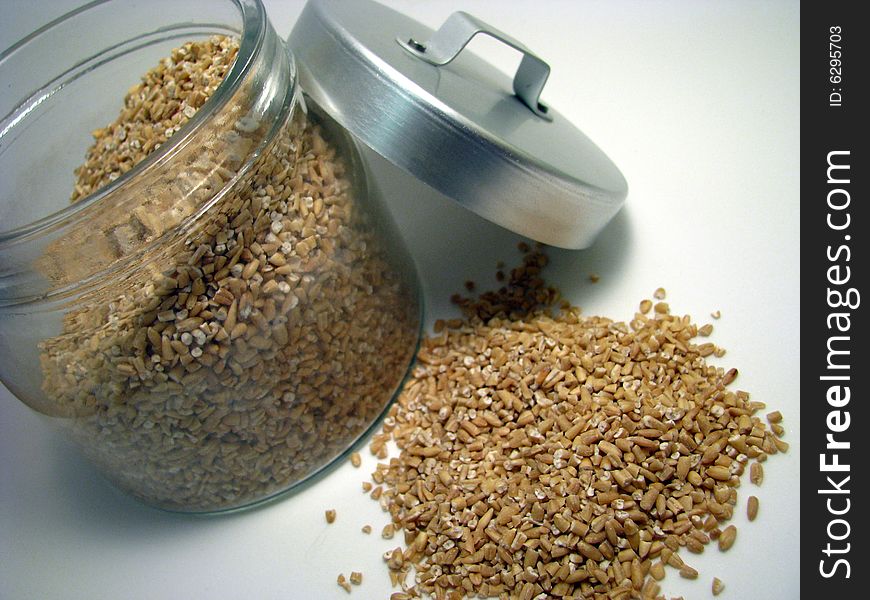 Pearl barley in and out of a glass jar