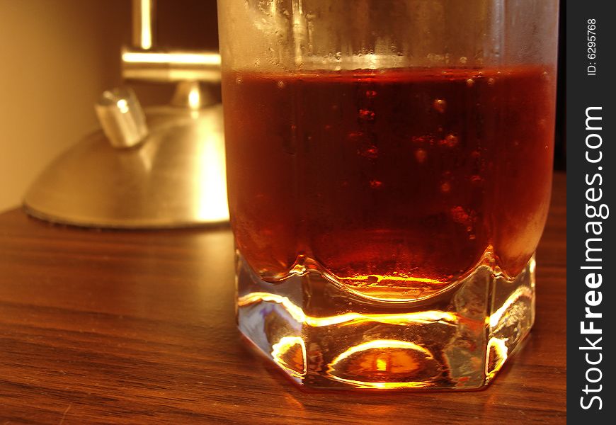 Glass on the table with fresh water. Glass on the table with fresh water