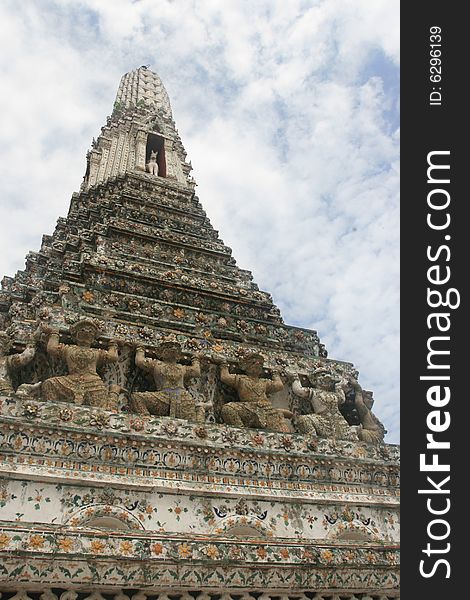 Wat arun in bangkok, thailand with beautiful relief and sculptures. Wat arun in bangkok, thailand with beautiful relief and sculptures.