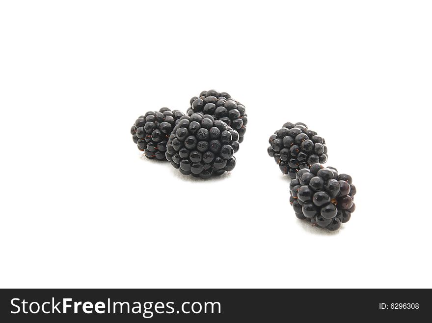 Group of plump, juicy blackberries ready to eat, isolated on white. Group of plump, juicy blackberries ready to eat, isolated on white