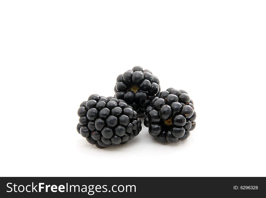 Group of plump, juicy blackberries ready to eat, isolated on white. Group of plump, juicy blackberries ready to eat, isolated on white