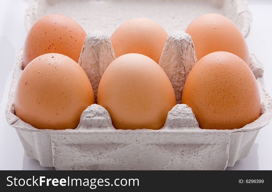 Half dozen eggs in a carton