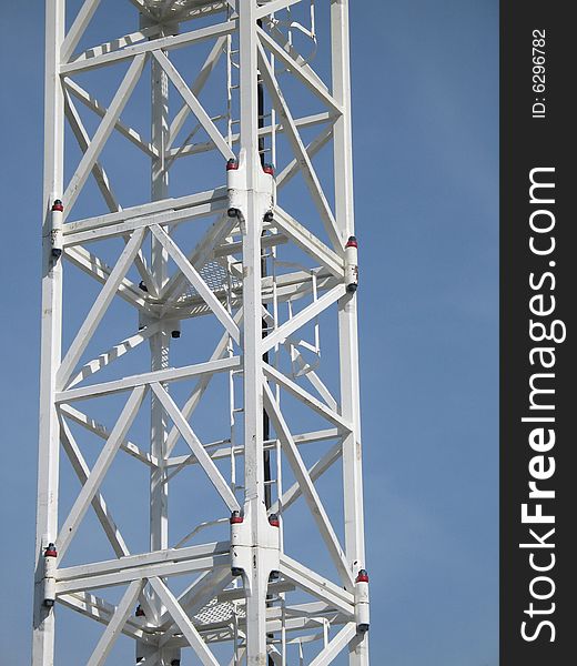A white construction crane frame