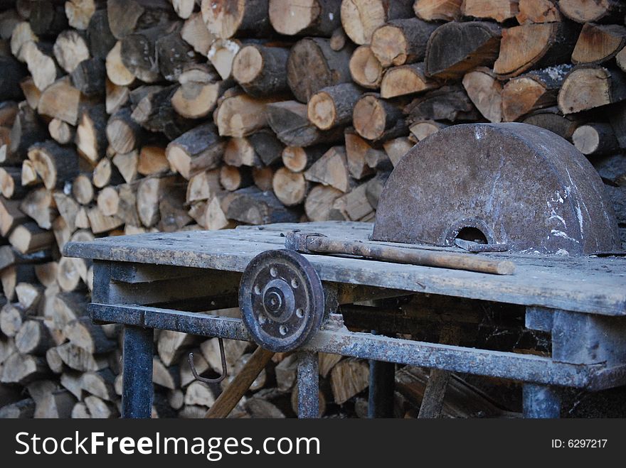 Fire wood and an old reciprocating saw. Fire wood and an old reciprocating saw