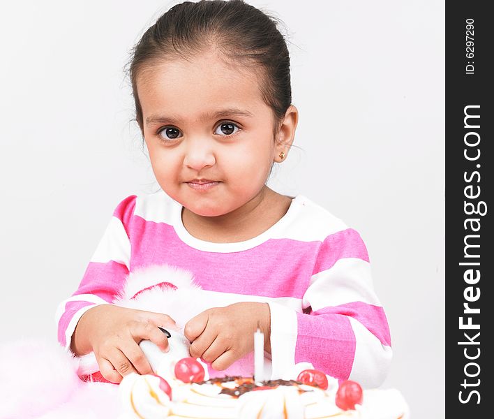 Girl in pink dress with cake. Girl in pink dress with cake