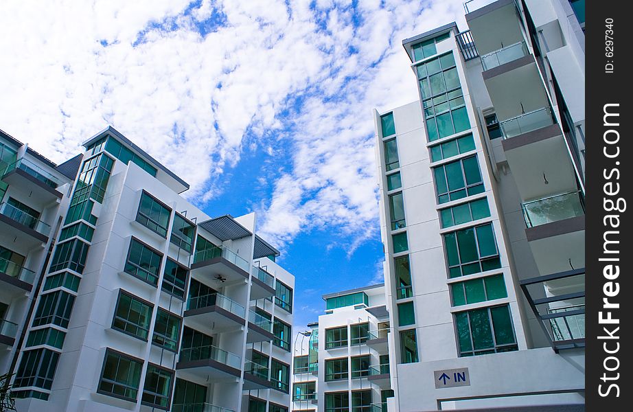 New tropical house exterior against blue sky. New tropical house exterior against blue sky