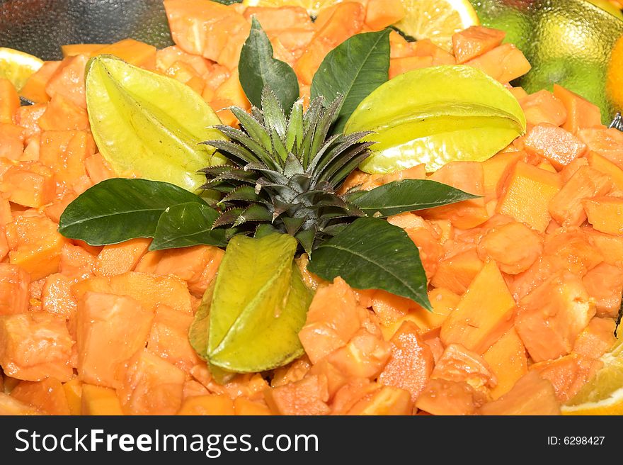 Fruit Salad display with kiwi fruit and fresh leaves