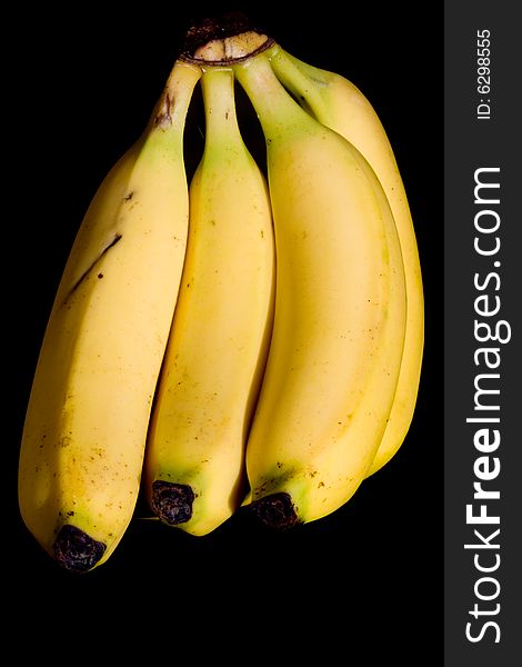 Bunch of bananas isolated on a black background